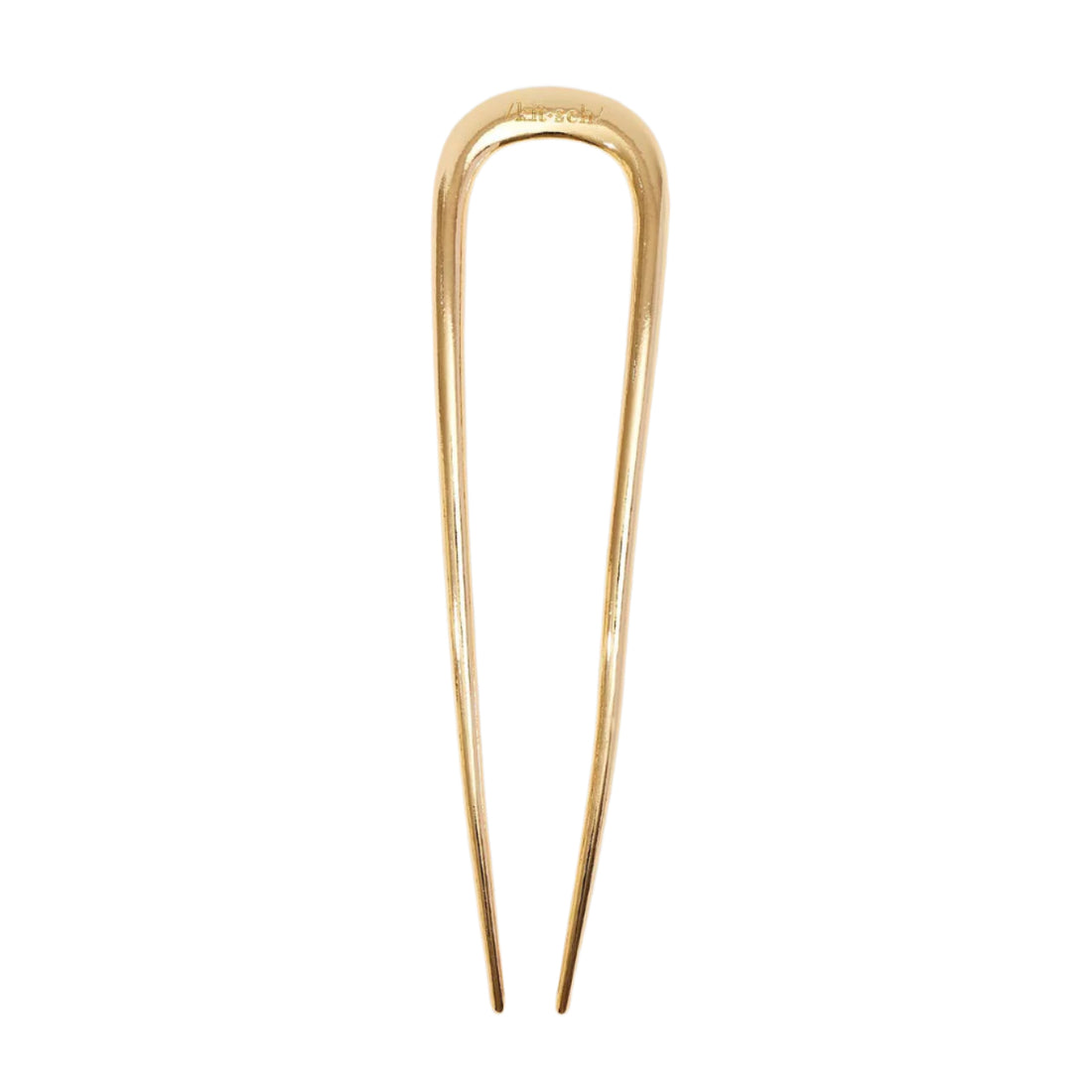 Gold hairpin on a light gray background